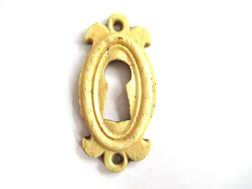 UpperDutch:Keyhole cover,Bone Keyhole cover, plate, bone escutcheon, keyhole frame.