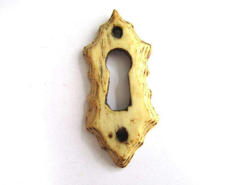 UpperDutch:Keyhole cover,Bone Keyhole cover, plate, bone escutcheon, keyhole frame.