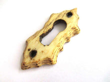 UpperDutch:Keyhole cover,Bone Keyhole cover, plate, bone escutcheon, keyhole frame.