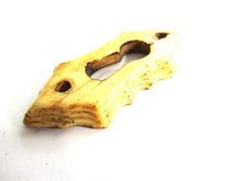 UpperDutch:Keyhole cover,Keyhole cover, plate, bone escutcheon, keyhole frame.