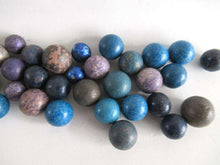 UpperDutch:Marbles,Set of 30 Antique Clay Marbles.