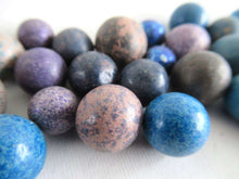 UpperDutch:Marbles,Set of 30 Antique Clay Marbles.