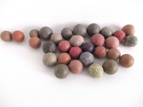 UpperDutch:Marbles,Set of 30 Antique Clay Marbles, Antique marbles.