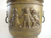 UpperDutch:Planter,Antique Brass Victorian Planter with Putti Angels cherubs Lion Handles, Brass Planter, Copper Pot, Antique Copper Planter