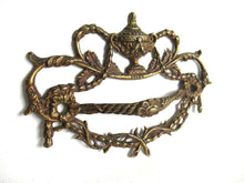 UpperDutch:,An Antique Brass Drawer Handle. Detailed Furniture Applique with Pull. Empire embellishment. 19th century restoration hardware