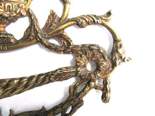 UpperDutch:,An Antique Brass Drawer Handle. Detailed Furniture Applique with Pull. Empire embellishment. 19th century restoration hardware