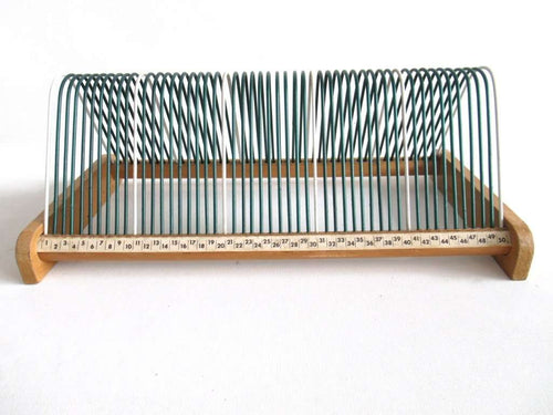 UpperDutch:,Vinyl record storage rack, retro green vinyl record holder. Music storage, record rack.