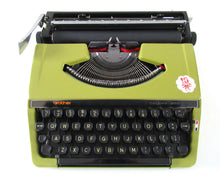 UpperDutch:Typewriter,Brother Deluxe 220 working typewriter. Green metal body, two tone ink ribbon. Portable writing machine.Office decor QWERTY layout