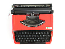UpperDutch:Typewriter,Brother Deluxe 220 working typewriter. Red metal body, two tone ink ribbon. Portable writing machine. Office decor QWERTY layout