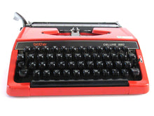 UpperDutch:Typewriter,Brother Deluxe 220 working typewriter. Red metal body, two tone ink ribbon. Portable writing machine. Office decor QWERTY layout