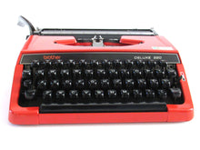 UpperDutch:Typewriter,Brother Deluxe 220 working typewriter. Red metal body, two tone ink ribbon. Portable writing machine. Office decor QWERTY layout