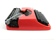 UpperDutch:Typewriter,Brother Deluxe 220 working typewriter. Red metal body, two tone ink ribbon. Portable writing machine. Office decor QWERTY layout