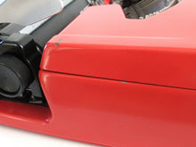 UpperDutch:Typewriter,Brother Deluxe 220 working typewriter. Red metal body, two tone ink ribbon. Portable writing machine. Office decor QWERTY layout