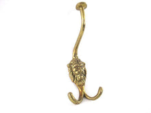 UpperDutch:,Lion hook. Solid Brass Lion Head Wall hook / Coat hook. Decorative animal storage solution, coat hangers. Ornate wall fixtures.