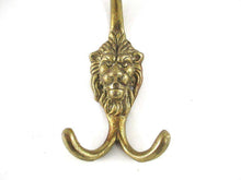 UpperDutch:,Lion hook. Solid Brass Lion Head Wall hook / Coat hook. Decorative animal storage solution, coat hangers. Ornate wall fixtures.