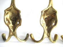 UpperDutch:,Set of 4 Brass Lion Head Wall hooks, Coat hooks. Decorative animal storage solution, coat hangers. Ornate wall fixtures.